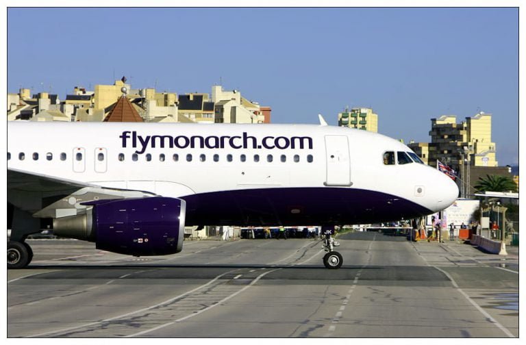 Gibraltar Airport - Monarch aircraft crosses the road