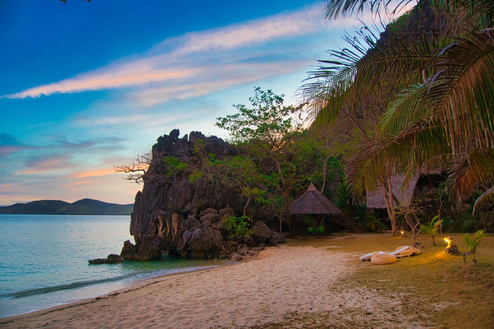 Sangat Island Dive Resort Villa Private Beach at Sunset