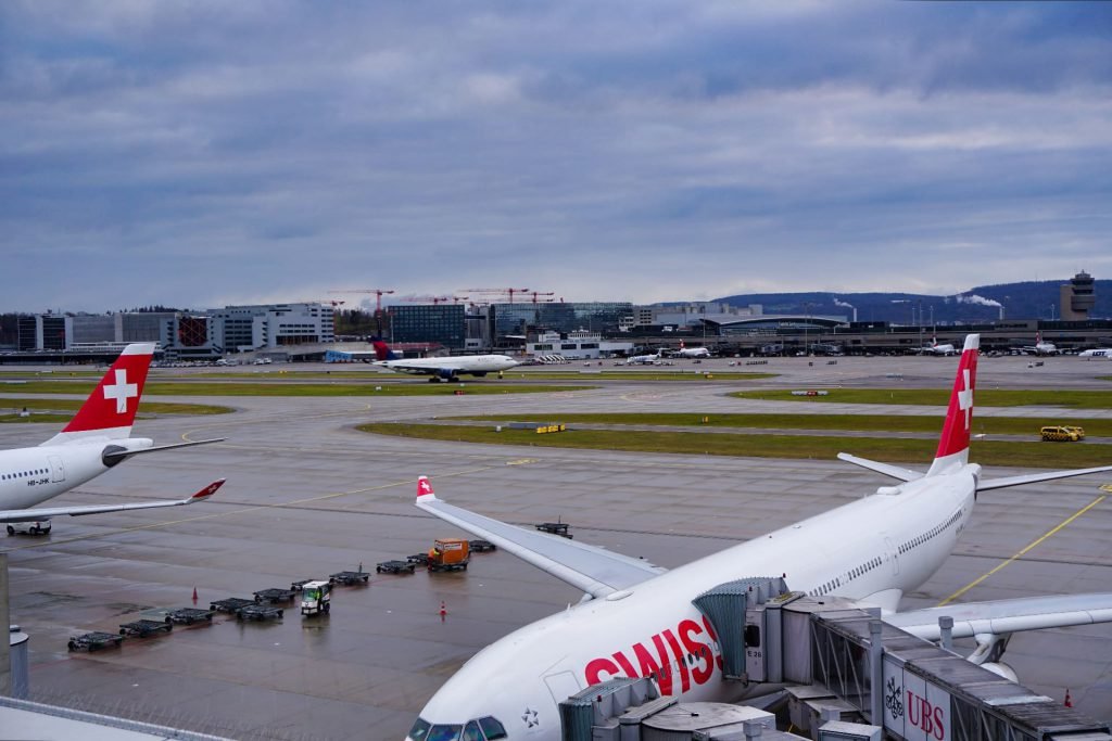 Swiss First Class Terminal Zurich runway landing Delta