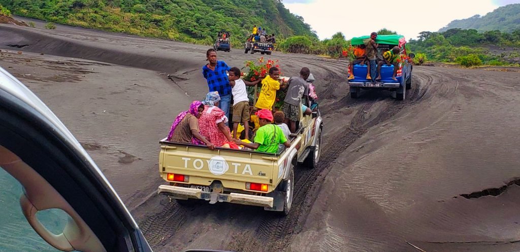 yasur volcano tanna vanuatu black volcanic ash driving pickups full locals river crossing