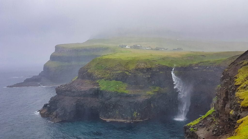 Faroe Islands Mulafossur Waterall in the wind